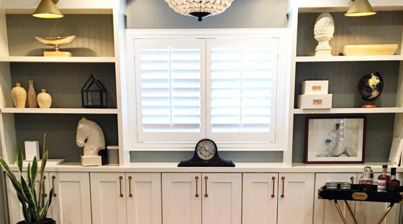 Plantation shutters inside of a built-in.